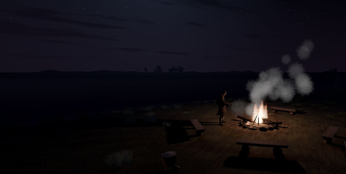 The shore camp at night, lit only by the fire